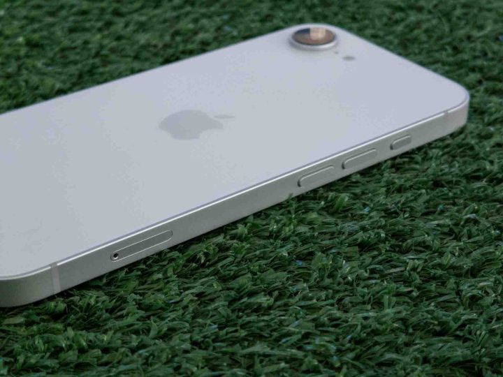 I started using iPhone 16E and it is better than my expectation 2 IPhone 16e on grass at one angle