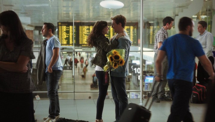 A woman and a male embrace in an airport in Pyaar Rosie.
