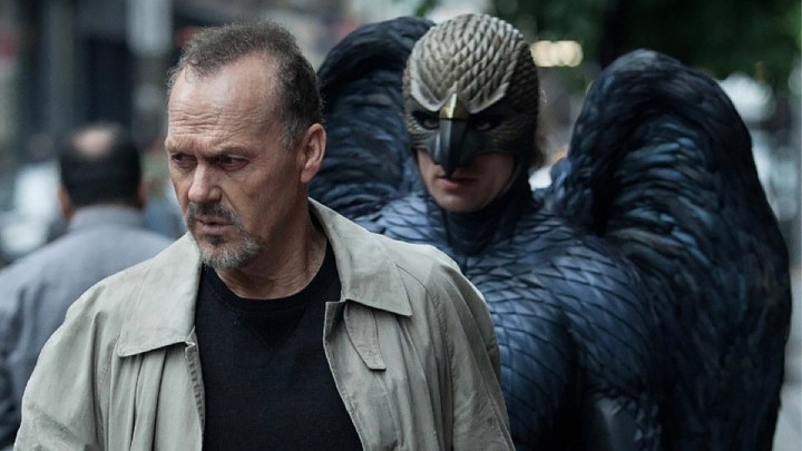 In a scene of Michael Keon Birdman, a bird is being followed by a man in the dress.