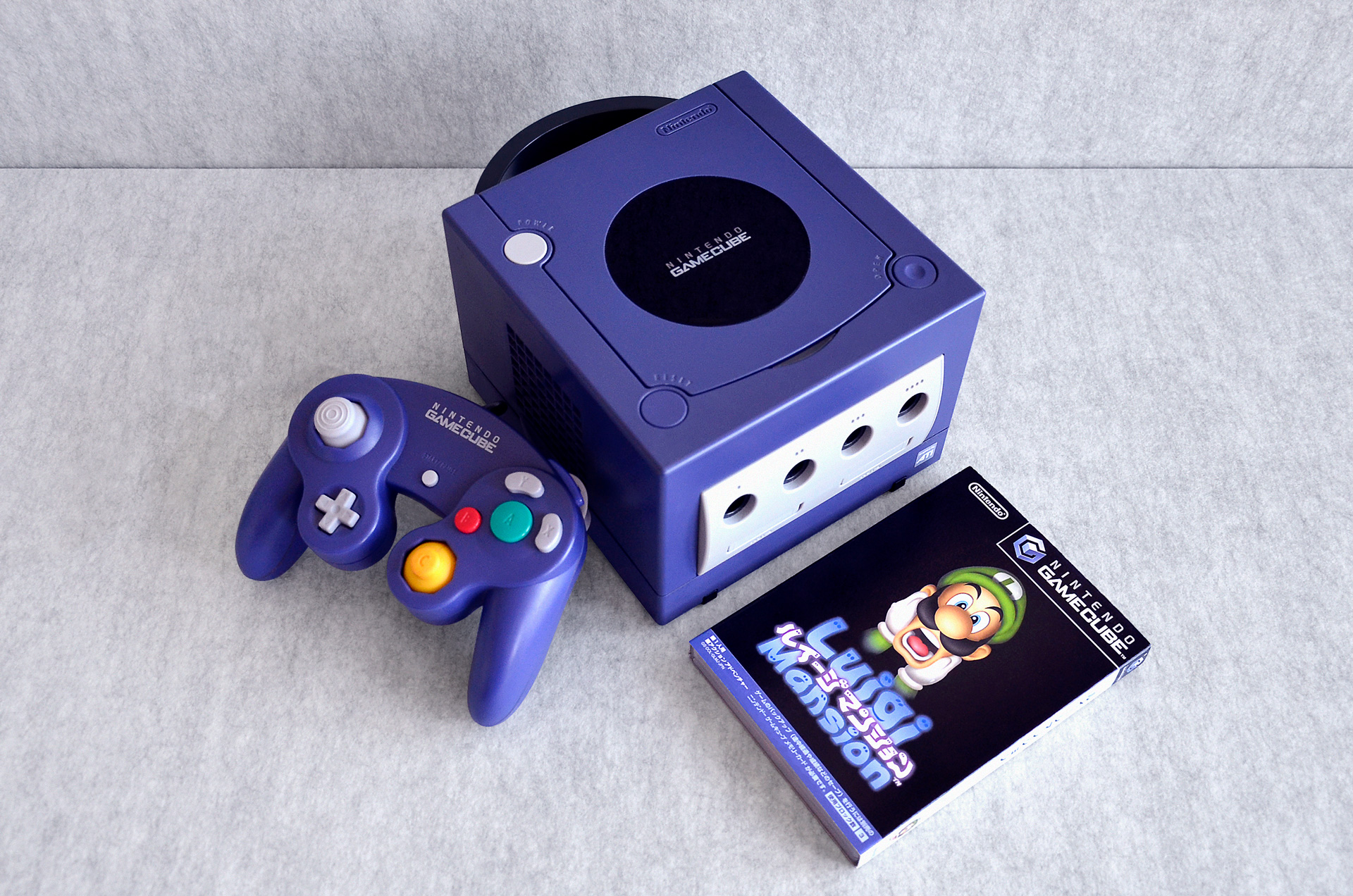 Beyond the Hype: The Real Best-Selling Games on Every Console 12 A Nintendo GameCube sits on a table with Luigi's Mansion.