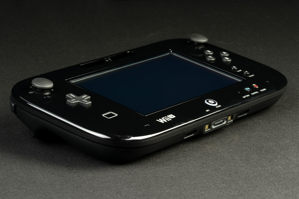 Beyond the Hype: The Real Best-Selling Games on Every Console 17 A Nintendo Wii U gamepad flat on a table.