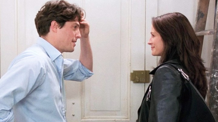 A man and a woman smiles in Notting Hill.